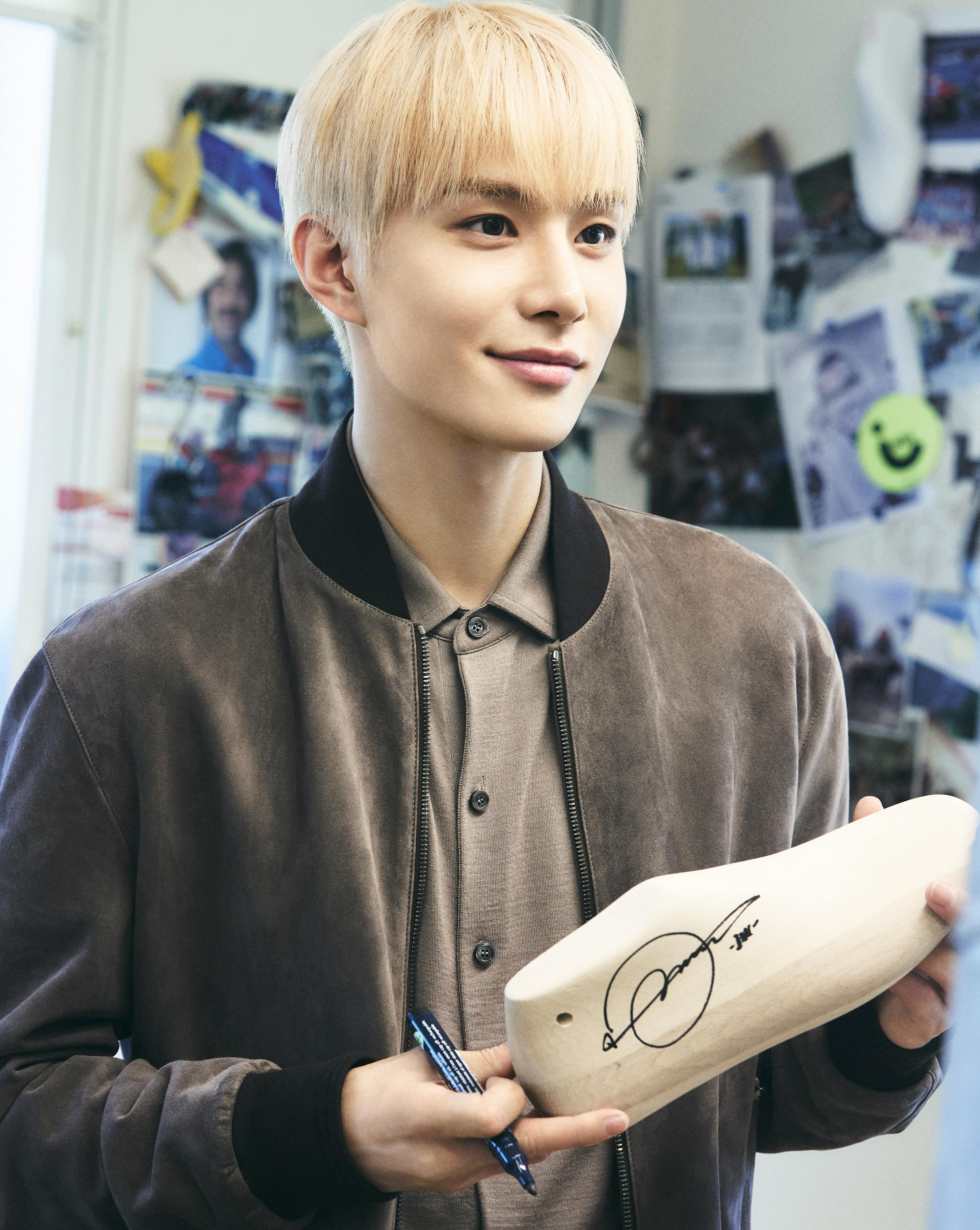 blonde hair person finger face portrait coat jacket handwriting pen